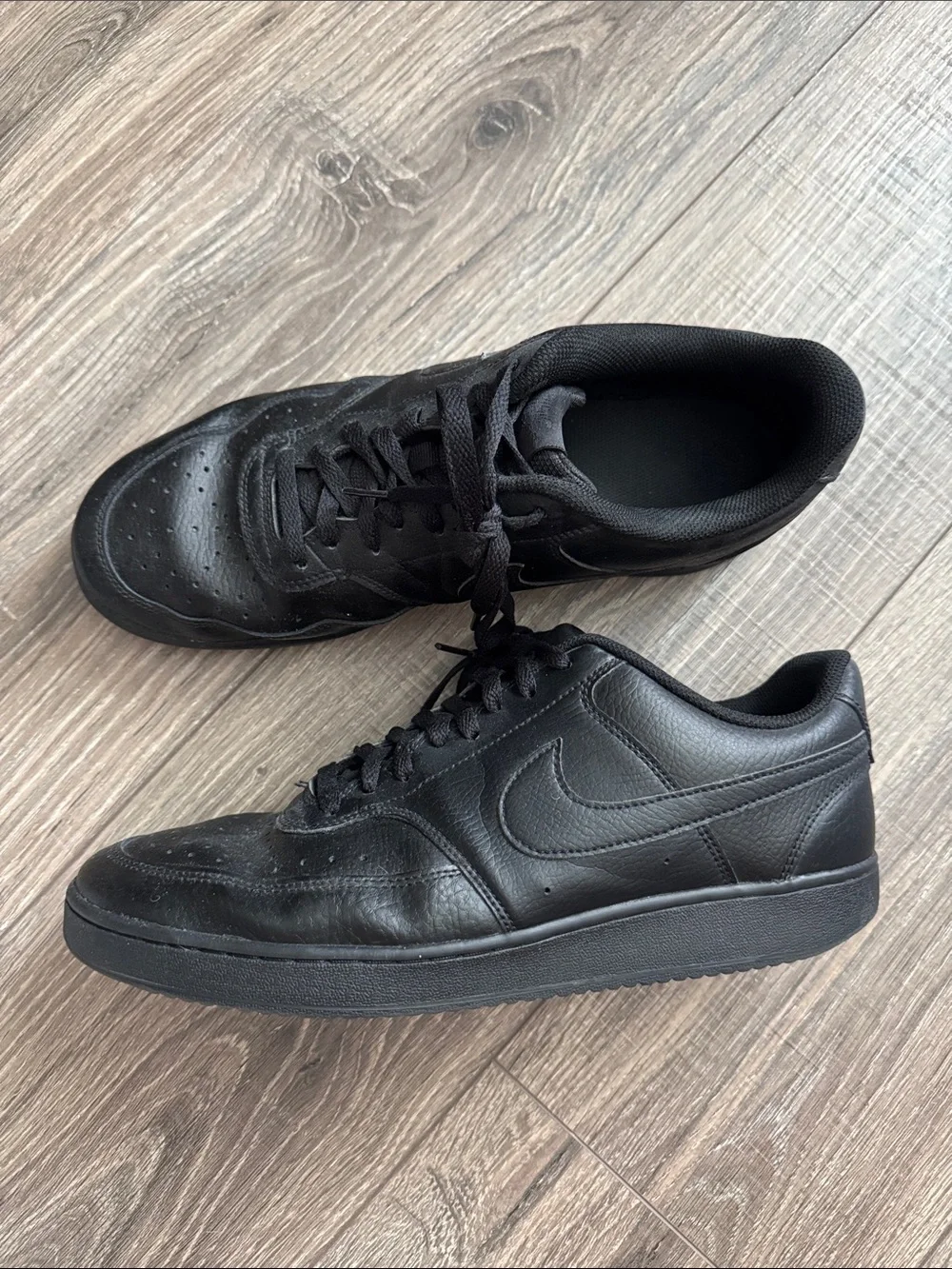 Nike Men’s All-Black Low-Top Leather Sneakers